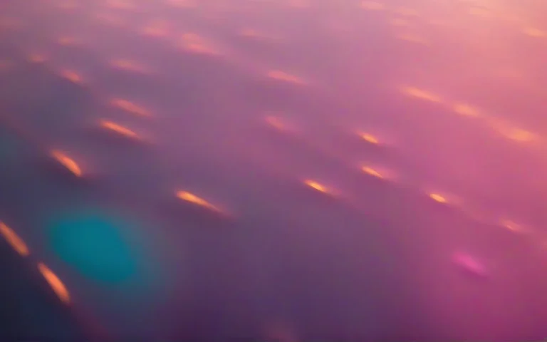 Abstract photograph of soft warm pools of light receding rhythmically into darkness