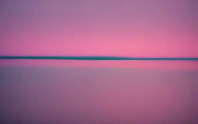 Abstract photograph of a still dark water surface holding a single soft highlight, wide and quiet